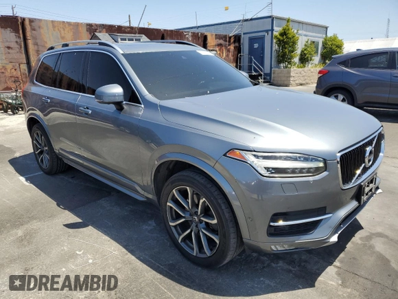 2016 Volvo XC90 T6 Momentum with VIN YV4A22PKXG1064288, listed as a Copart auction lot 57357315 with 121,331 mi miles and Salvage title. Bid and sale history available at DreamBid. Image 4.