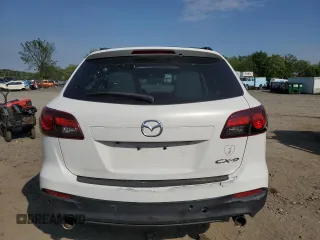 2015 Mazda CX-9 Touring z VIN JM3TB2CA7F0467259, wystawiony jako Copart lot #55646055 z przebiegiem Nie podano mil oraz Czysty tytuł • Clean title. Historia ofert i sprzedaży dostępna na DreamBid. Obrazek 6.