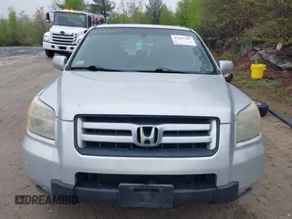 2006 Honda Pilot EX-L with VIN 2HKYF18606H513308, listed as a IAAI auction lot 42187787 with 185,716 mi miles and . Bid and sale history available at DreamBid. Image 15.