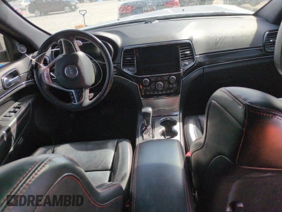 2021 Jeep Grand Cherokee Trailhawk with VIN 1C4RJFLG4MC703945, listed as a Copart auction lot 50703085 with 57,109 mi miles and Salvage Title. Bid and sale history available at carsss.com. Image 8.