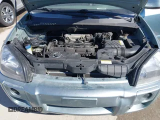 2006 Hyundai Tucson GL with VIN KM8JM12B76U276847, listed as a IAAI auction lot 41767240 with 204,713 mi miles. Bid and sale history available at carsss.com. Image 10.