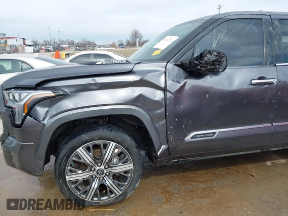 2022 Toyota Tundra Capstone Hybrid with VIN 5TFVC5DB6NX005465, listed as a IAAI auction lot 41589222 with 28,452 mi miles and . Bid and sale history available at DreamBid. Image 14.