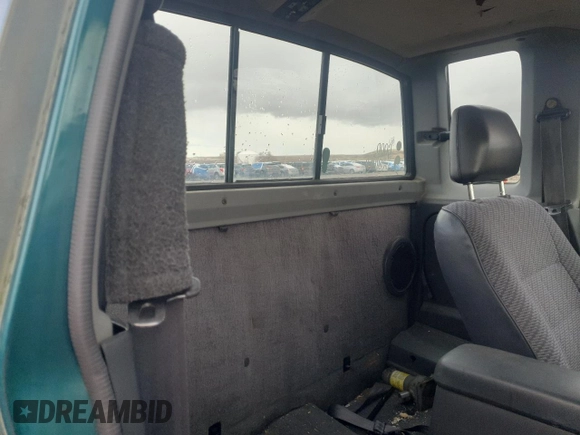 1996 Nissan Frontier XE with VIN 1N6SD16SXTC322219, listed as a Copart auction lot 49043685 with 102,964 mi miles and Salvage title. Bid and sale history available at DreamBid. Image 11.