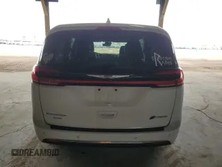 2022 Chrysler Pacifica Hybrid Limited with VIN 2C4RC1S74NR123134, listed as a Copart auction lot 57906795 with 75,648 mi miles and Salvage title. Bid and sale history available at DreamBid. Image 6.