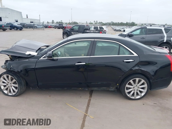 2015 Cadillac ATS Sedan Luxury RWD with VIN 1G6AB5RX3F0102898, listed as a IAAI auction lot 41943935 with 160,985 mi miles. Bid and sale history available at carsss.com. Image 15.