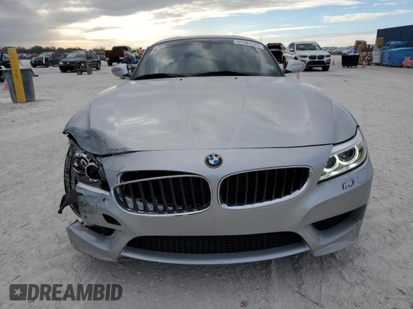 2016 BMW Z4 sDrive28i with VIN WBALL5C54G5A21231, listed as a Copart auction lot 89387225 with 30,765 mi miles and Salvage Title. Bid and sale history available at carsss.com. Image 5.