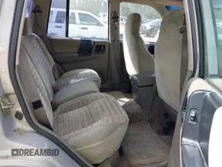 1994 Jeep Grand Cherokee Laredo with VIN 1J4GZ58Y0RC200247, listed as a IAAI auction lot 41781078 with 217,698 mi miles. Bid and sale history available at carsss.com. Image 8.