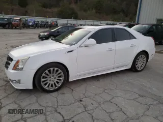 2011 Cadillac CTS Performance with VIN 1G6DM5ED0B0136813, listed as a Copart auction lot 79106114 with 97,796 mi miles and Salvage Title. Bid and sale history available at DreamBid. Image 1.