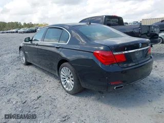2010 BMW 7 Series 750Li with VIN WBAKB8C54ACY63650, listed as a IAAI auction lot 41961941 with 127,405 mi miles. Bid and sale history available at carsss.com. Image 3.