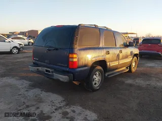 2003 Chevrolet Tahoe LS with VIN 1GNEC13V43R297842, listed as a IAAI auction lot 41653912 with 181,955 mi miles. Bid and sale history available at carsss.com. Image 4.