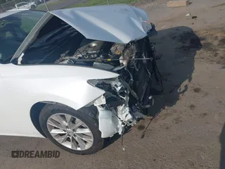 2013 Lexus ES 300h with VIN JTHBW1GG9D2026119, listed as a IAAI auction lot 42199139 with 187,412 mi miles and . Bid and sale history available at DreamBid. Image 6.