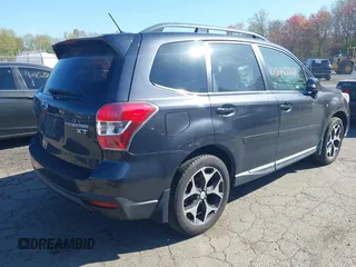 2015 Subaru Forester 2.0XT Touring with VIN JF2SJGWCXFH514739, listed as a IAAI auction lot 42143364 with 107,359 mi miles. Bid and sale history available at carsss.com. Image 4.