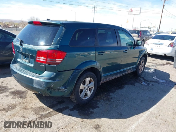 2009 Dodge Journey SXT with VIN 3D4GG57V09T170094, listed as a IAAI auction lot 41867577 with 122,831 mi miles. Bid and sale history available at carsss.com. Image 4.