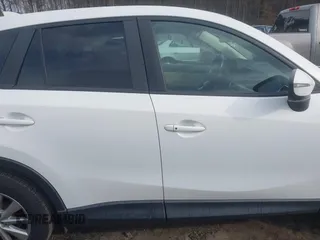 2016 Mazda CX-5 Touring with VIN JM3KE2CY5G0791537, listed as a IAAI auction lot 41396276 with 42,095 mi miles. Bid and sale history available at carsss.com. Image 14.