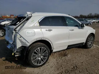 2024 Cadillac XT4 AWD Premium Luxury with VIN 1GYFZDR40RF225603, listed as a Copart auction lot 87899975 with 1,659 mi miles and Salvage title. Bid and sale history available at DreamBid. Image 3.