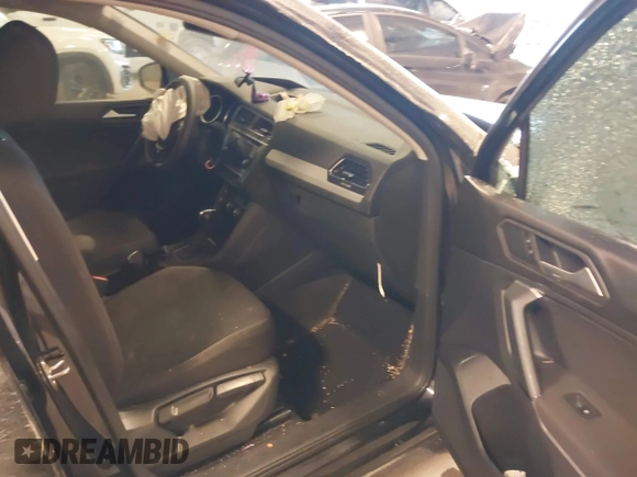 2019 Volkswagen Tiguan S with VIN 3VV0B7AX3KM182311, listed as a IAAI auction lot 41727114 with 98,035 mi miles and . Bid and sale history available at DreamBid. Image 5.