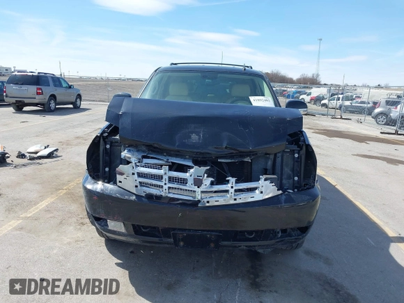 2007 Cadillac Escalade with VIN 1GYFK63887R175010, listed as a IAAI auction lot 41892482 with 121,231 mi miles. Bid and sale history available at carsss.com. Image 6.