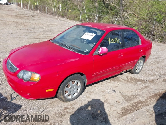 2002 Kia Spectra GS with VIN KNAFB161425076186, listed as a IAAI auction lot 42007615 with 90,269 mi miles. Bid and sale history available at carsss.com. Image 2.