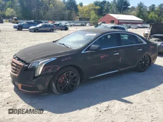 2018 Cadillac XTS Livery z VIN 2G61U5S35J9168773, wystawiony jako Copart lot #54818035 z przebiegiem 62 219 mil mil oraz Szkoda całkowita • Salvage title. Historia ofert i sprzedaży dostępna na DreamBid. Obrazek 1.