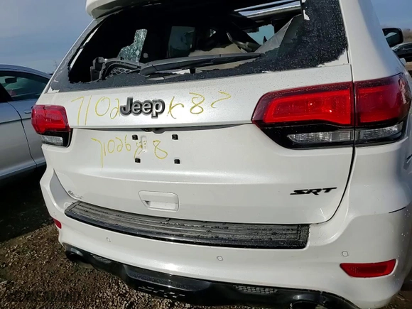 2021 Jeep Grand Cherokee SRT with VIN 1C4RJFDJ0MC548983, listed as a Copart auction lot 84048824 with 45,247 mi miles and Salvage Title. Bid and sale history available at carsss.com. Image 15.