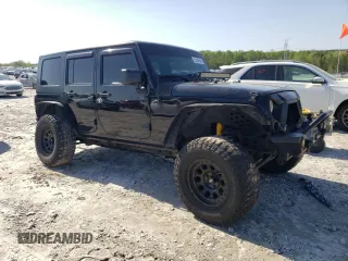 2013 Jeep Wrangler Unlimited Moab with VIN 1C4HJWEG7DL600043, listed as a Copart auction lot 52146945 with 118,882 mi miles and Salvage title. Bid and sale history available at DreamBid. Image 4.