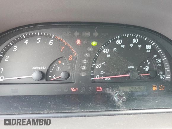 2004 Toyota Camry LE z VIN 4T1BE32K34U305013, wystawiony jako Copart lot #60912085 z przebiegiem 127 247 mil mil oraz Szkoda całkowita • Salvage title. Historia ofert i sprzedaży dostępna na DreamBid. Obrazek 9.