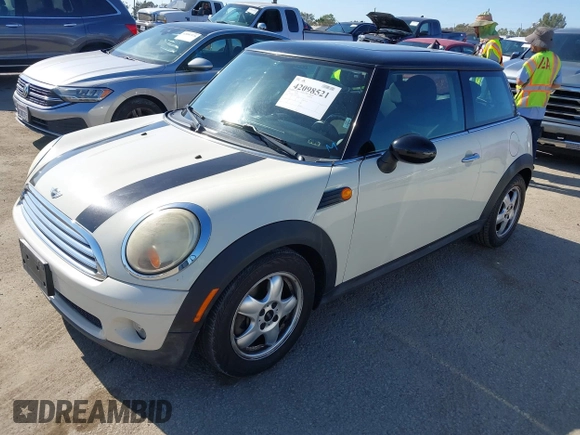 2010 MINI Hardtop with VIN WMWMF3C59ATZ66563, listed as a IAAI auction lot 42098521 with 153,734 mi miles and . Bid and sale history available at DreamBid. Image 2.