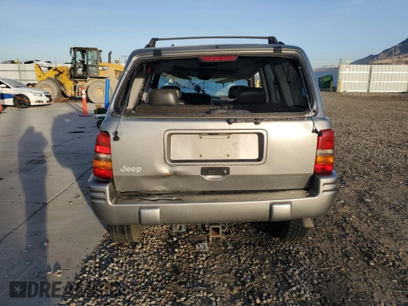 1998 Jeep Grand Cherokee Limited с VIN 1J4GZ78Y0WC260231, выставлен на аукционе Copart как лот 85149724 с пробегом 203 258 миль миль и Списание • Salvage title. История ставок и продаж доступна на DreamBid. Изображение 6.