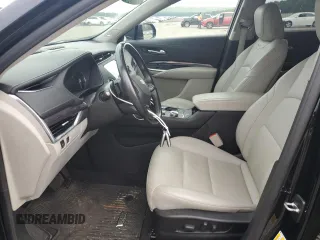 2021 Cadillac XT4 AWD Luxury with VIN 1GYFZBR4XMF014647, listed as a Copart auction lot 63800444 with 49,724 mi miles and Salvage Title. Bid and sale history available at carsss.com. Image 7.