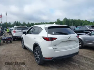 2018 Mazda CX-5 Grand Touring with VIN JM3KFBDM0J0308813, listed as a IAAI auction lot 42657978 with 78,119 mi miles and . Bid and sale history available at DreamBid. Image 3.