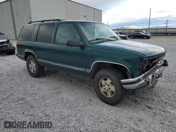 1996 GMC Yukon with VIN 1GKEK13R6TJ747606, listed as a Copart auction lot 80763434 with 308,837 mi miles and Salvage Title. Bid and sale history available at DreamBid. Image 4.