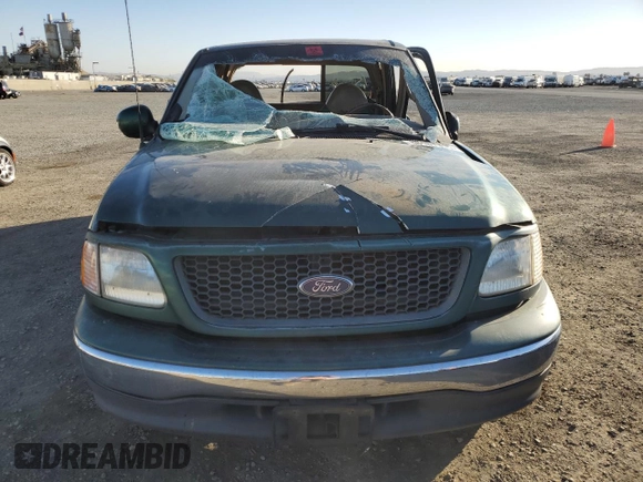 2000 Ford F-150 XL with VIN 1FTRX17W4YNB17453, listed as a Copart auction lot 52051215 with Not provided miles and Salvage title. Bid and sale history available at DreamBid. Image 5.