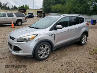 2014 Ford Escape Titanium с VIN 1FMCU0J99EUD83625, выставлен на аукционе Copart как лот 63504125 с пробегом 106 848 миль миль и Списание • Salvage title. История ставок и продаж доступна на DreamBid. Изображение 1.