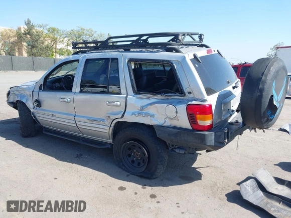 2004 Jeep Grand Cherokee Limited with VIN 1J8GW58N44C390592, listed as a IAAI auction lot 42150161 with Not provided miles and . Bid and sale history available at DreamBid. Image 3.