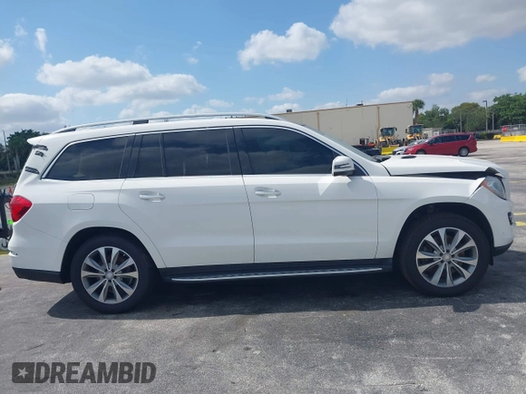 2014 Mercedes-Benz GL-Class GL 450 with VIN 4JGDF7CE0EA298157, listed as a IAAI auction lot 42094478 with 202,424 mi miles. Bid and sale history available at carsss.com. Image 12.
