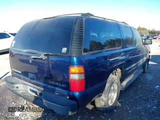 2002 Chevrolet Suburban LT z VIN 1GNEC16Z32J237983, wystawiony jako IAAI lot #41466060 z przebiegiem 260 343 mil mil oraz . Historia ofert i sprzedaży dostępna na DreamBid. Obrazek 4.
