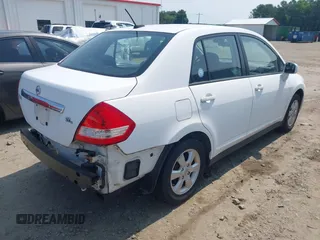 2010 Nissan Versa S with VIN 3N1BC1AP1AL420360, listed as a IAAI auction lot 42404492 with 121,897 mi miles and . Bid and sale history available at DreamBid. Image 4.