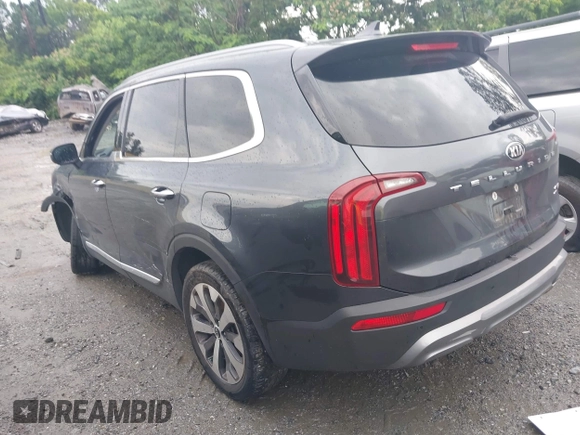 2021 Kia Telluride S with VIN 5XYP64HC8MG127498, listed as a IAAI auction lot 42371890 with 100,748 mi miles and . Bid and sale history available at DreamBid. Image 3.