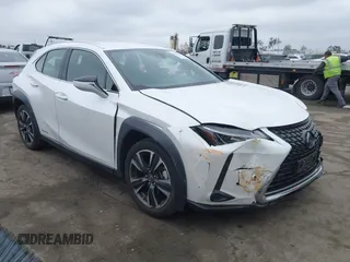2021 Lexus UX 250h z VIN JTHX9JBH5M2038636, wystawiony jako IAAI lot #42207087 z przebiegiem 29 529 mil mil oraz . Historia ofert i sprzedaży dostępna na DreamBid. Obrazek 1.