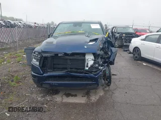 2023 Ram 1500 Laramie with VIN 1C6SRFJT9PN542437, listed as a IAAI auction lot 42256410 with 5 mi miles and . Bid and sale history available at DreamBid. Image 12.
