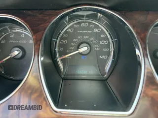 2010 Ford Taurus Limited with VIN 1FAHP2FW3AG125031, listed as a IAAI auction lot 42801338 with 128,310 mi miles and . Bid and sale history available at DreamBid. Image 6.