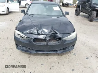 2015 BMW 3 Series 328i with VIN WBA3A5G55FNS82637, listed as a IAAI auction lot 41815354 with 126,054 mi miles and . Bid and sale history available at DreamBid. Image 6.