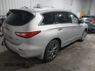 2013 Infiniti JX35 with VIN 5N1AL0MMXDC344217, listed as a IAAI auction lot 41608279 with 106,015 mi miles and . Bid and sale history available at DreamBid. Image 4.