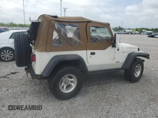 1998 Jeep Wrangler SE with VIN 1J4FY29P6WP796472, listed as a Copart auction lot 54879025 with 118,664 mi miles and Salvage title. Bid and sale history available at DreamBid. Image 3.