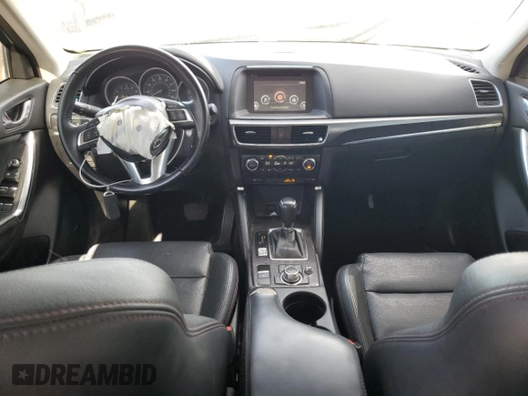 2016 Mazda CX-5 Grand Touring with VIN JM3KE2DY0G0888854, listed as a Copart auction lot 68379754 with 73,096 mi miles and Salvage Title. Bid and sale history available at carsss.com. Image 8.