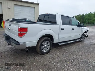 2014 Ford F-150 XL with VIN 1FTFW1CT0EKF51223, listed as a IAAI auction lot 42117076 with 176,505 mi miles. Bid and sale history available at carsss.com. Image 4.