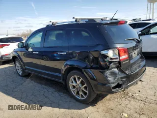 2013 Dodge Journey Crew with VIN 3C4PDCDG4DT588442, listed as a Copart auction lot 51350775 with 151,172 mi miles and Salvage title. Bid and sale history available at DreamBid. Image 2.