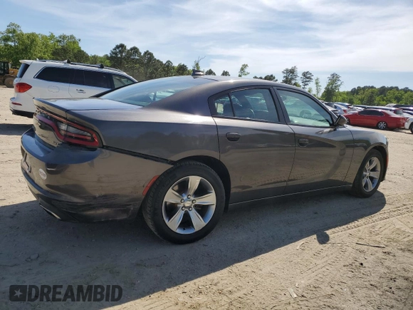 2015 Dodge Charger SXT with VIN 2C3CDXHG8FH794623, listed as a Copart auction lot 52000144 with 145,624 mi miles and Salvage Title. Bid and sale history available at DreamBid. Image 3.