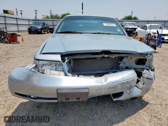 2004 Ford Crown Victoria LX z VIN 2FAFP74W54X184815, wystawiony jako Copart lot #57280725 z przebiegiem 294 513 mil mil oraz Szkoda całkowita • Salvage title. Historia ofert i sprzedaży dostępna na DreamBid. Obrazek 5.