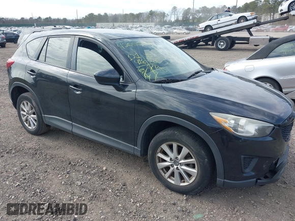 2014 Mazda CX-5 Sport with VIN JM3KE4BE4E0426931, listed as a IAAI auction lot 42055582 with 121,418 mi miles. Bid and sale history available at carsss.com. Image 1.